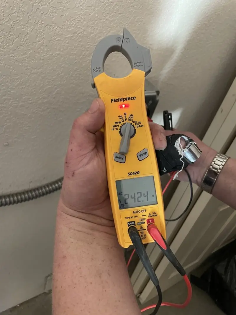 Voltage testing with clamp meter during Generator Installation in Elkland